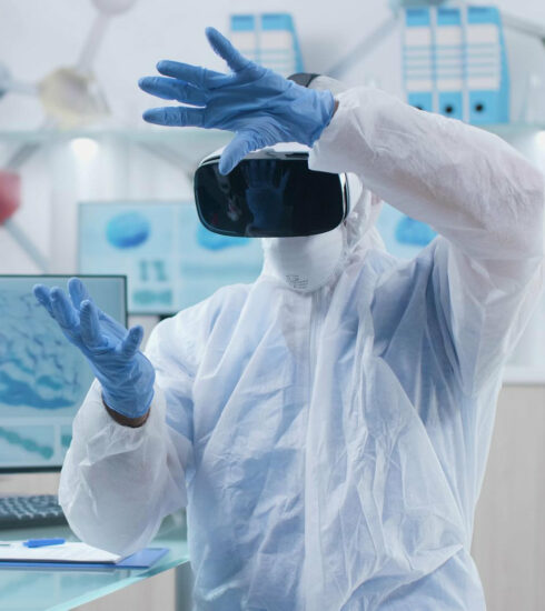 scientist researcher wearing virtual reality headset analyzing brain activity futuristic holografic interface during chemistry experiment biochemistry hospital laboratory neuroscience research